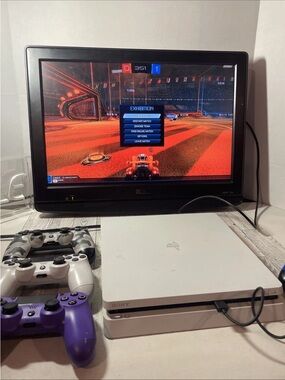 Sony White PS4 Slim with White, Purple and Camo Controllers